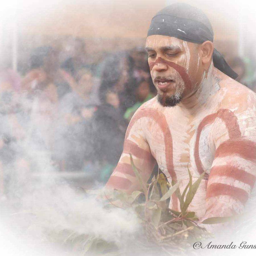 Ryka Ali tending the smoking ceremony fire